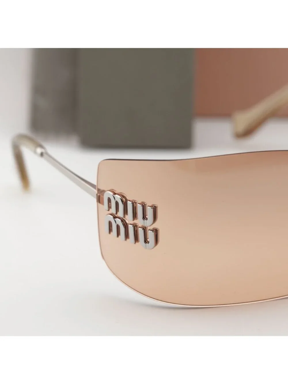 Miu Miu MUB53S 1BC80Y Shield Sunglasses – Silver / Orange